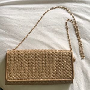Gold stitch clutch bag